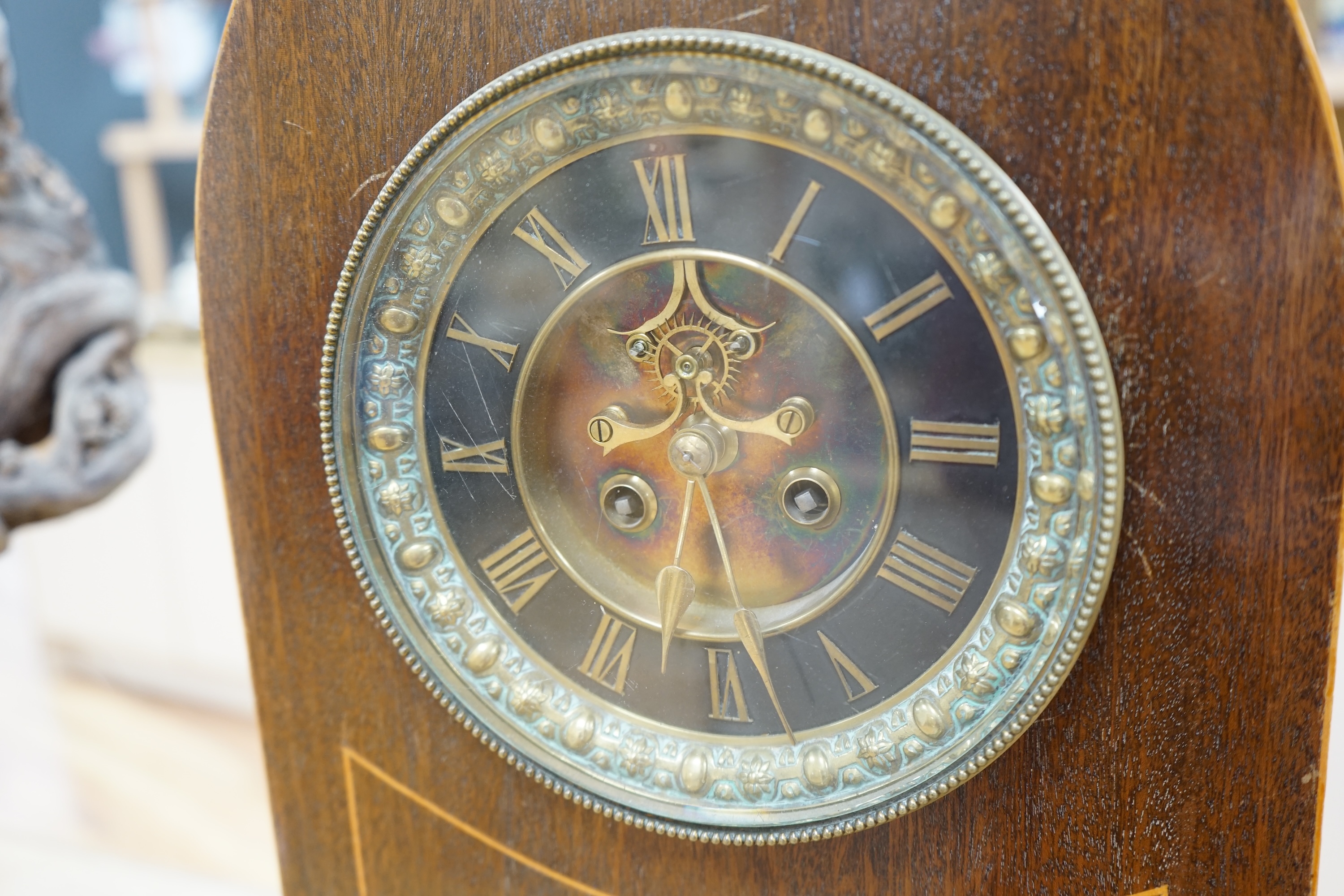 A late 19th century shell inlaid mahogany eight day lancet topped bracket clock, 56cm high. Condition - case good, clock lacking pendulum, untested if working.